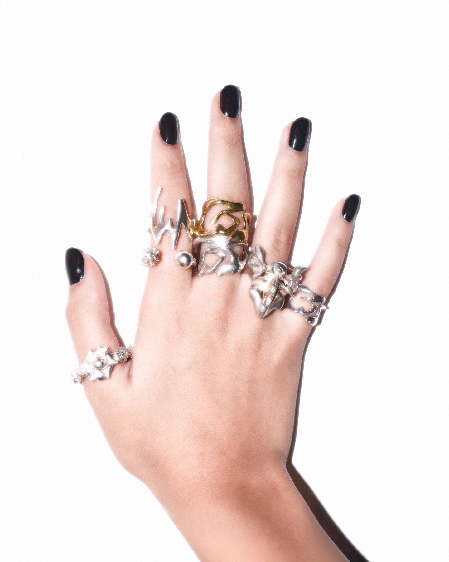 Zyma Studio rings worn on hand